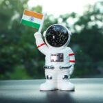 Solar Power Astronaut Ornament Moving Hand with Indian Flag (1 Pc) - Full Detail by Nari Haat, Indian ethnic wear, wo...