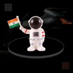 Solar Power Astronaut Ornament Moving Hand with Indian Flag (1 Pc) - Full Detail by Nari Haat, Indian ethnic wear, wo...