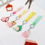 Silicone Keychain with Wrist Strap & Squeeze Toy (1 Pc Mix design) - Front View by Nari Haat, Indian ethnic wear, wom...