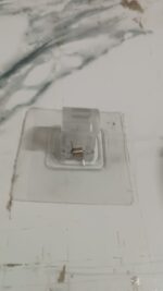 Self-Adhesive Transparent Wall Hook Holder Clip (1 Pc) - Full Detail by Nari Haat, Indian ethnic wear, women clothing...