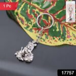 Premium Silver-Finish Metal Bal Krishna Eating Makhan Keychain (1 Pc) - With Dupatta by Nari Haat, Indian ethnic wear...