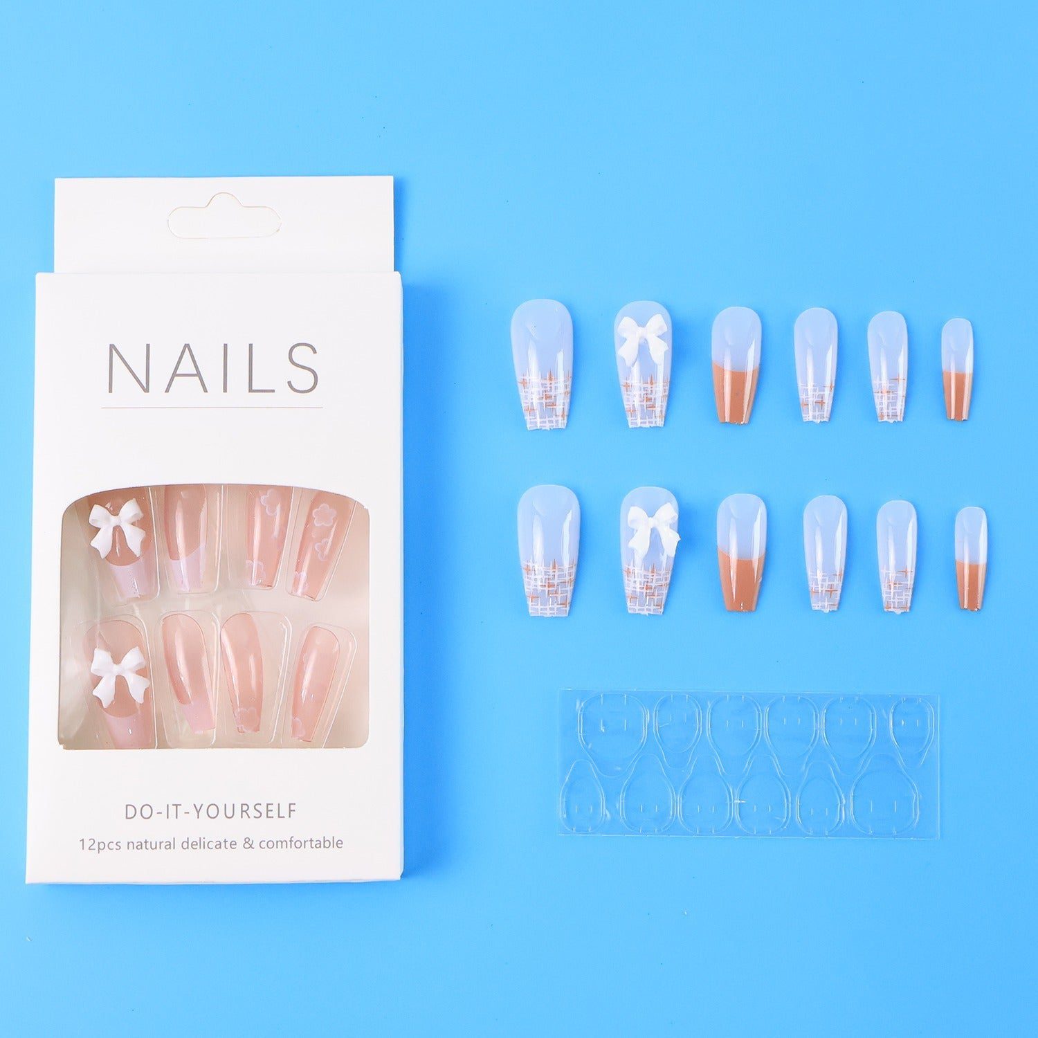 3f086b0a-2873-4fd8-b44c-f9338c9a697e_ae930b26-577c-4d35-bd70-aed6daffc7c3.jpg Reusable Press-On Artificial Nails with Adhesive Stickers fake nails (1 Pkt) - Front View by Nari Haat, Indian ethnic...