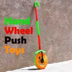 Plastic Single Wheel Push Run toy handle and two lights on wheel. push toy for Kids - Sleeve Design by Nari Haat, Ind...