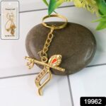 Flute and Peacock Feather Krishna Design Keychain (1 Pc) - With Dupatta by Nari Haat, Indian ethnic wear, women cloth...