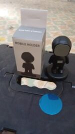 Cartoon Astronaut Magnetic Mobile Phone Holder – 360° Rotating Car Mount (1 Pc) - Fabric Detail by Nari Haat, Indi...