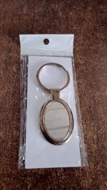 Elegant Oval Shape Metal Keychain for Personal Use - Full Detail by Nari Haat, Indian ethnic wear, women clothing, de...