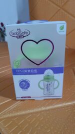 Plastic Baby Feeding Bottle with Handles, Cleaning brush & Straw (300 ML / 1 Pc) - Fabric Detail by Nari Haat, Indian...