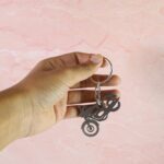 Motorcycle Silhouette Metal Keychain - (1 Pc) - Fabric Detail by Nari Haat, Indian ethnic wear, women clothing, desig...