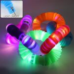 LED Glow Pop Tube Fidget Toy (Mix Color / 1 Pc) - Fabric Detail by Nari Haat, Indian ethnic wear, women clothing, des...