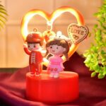 Cute Romantic Couple Love Showpiece with Heart Frame (1 Pc) - Fabric Detail by Nari Haat, Indian ethnic wear, women c...