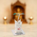 Silver-Plated Kamdhenu Cow & Tulsi Plant Pair – Pooja & Home Décor - Fabric Detail by Nari Haat, Indian ethnic wea...