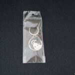 Devotional “Jai Shri Ram” Metal Keychain - (1 Pc) - Fabric Detail by Nari Haat, Indian ethnic wear, women clothin...