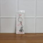 Premium Silver-Finish Metal Bal Krishna Eating Makhan Keychain (1 Pc) - Full Detail by Nari Haat, Indian ethnic wear,...