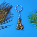 Premium Antique-Gold Metal Bal Krishna Makhan Chor Keychain (1 Pc) - Neckline Detail by Nari Haat, Indian ethnic wear...