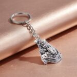 Premium Silver-Finish Metal Keychain (1 Pc) - Neckline Detail by Nari Haat, Indian ethnic wear, women clothing, desig...