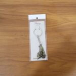 Premium Antique-Gold Metal Bal Krishna Makhan Chor Keychain (1 Pc) - Fabric Detail by Nari Haat, Indian ethnic wear, ...