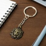 Premium Lion Head Metal Keychain (1 Pc) - Back View by Nari Haat, Indian ethnic wear, women clothing, designer suit