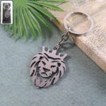 Stylish Metal Lion Head Keychain (1 Pc) - Front View by Nari Haat, Indian ethnic wear, women clothing, designer suit