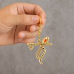 Flute and Peacock Feather Krishna Design Keychain (1 Pc) - Neckline Detail by Nari Haat, Indian ethnic wear, women cl...