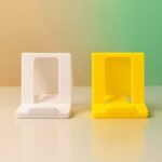 Adjustable Foldable Plastic Mobile Phone Stand (1 Pc / Mix Color) - Full Detail by Nari Haat, Indian ethnic wear, wom...