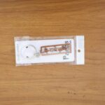 Radha Krishna Religious Metal Keychain (1 Pc) - Fabric Detail by Nari Haat, Indian ethnic wear, women clothing, desig...