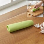 Silicone Garlic Peeler Tube Easy Hand Roller Peeling Tool (1 Pc) - Front View by Nari Haat, Indian ethnic wear, women...