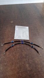 Adjustable Black Bead Evil Eye Protection Bracelet Set (2 Pc) - Fabric Detail by Nari Haat, Indian ethnic wear, women...