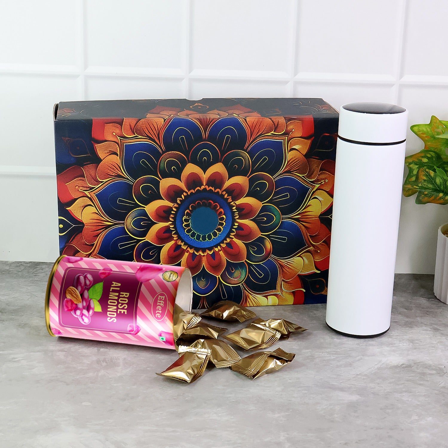 WhatsAppImage2025-09-12at3.22.16PM.jpg Effete Rose Almonds Gift Hamper, Golden With Bottle (2 Pc Set), Mix Color - Front View by Nari Haat, Indian ethnic we...