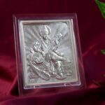 Elegant Silver Saraswati Maa Photo Frame with Stand (1 Pc) - Neckline Detail by Nari Haat, Indian ethnic wear, women ...
