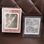 Elegant Silver Saraswati Maa Photo Frame with Stand (1 Pc) - Fabric Detail by Nari Haat, Indian ethnic wear, women cl...