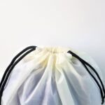 Multipurpose Drawstring Backpack with Printed Eagle Design (1 Pc) - Fabric Detail by Nari Haat, Indian ethnic wear, w...