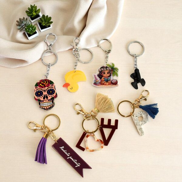 Trendy Designer Assorted Keychains (Mix Design / 1 Pc) - Front View by Nari Haat, Indian ethnic wear, women clothing,...