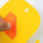 1 Pc Wallmount Mobile Stand With Hook for and stuffs purposes. (Mix Color / 1 Pc) - Neckline Detail by Nari Haat, Ind...