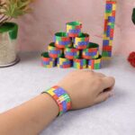 Colorful Snap Slap Bracelet Toy (12 Pc Set ) - Fabric Detail by Nari Haat, Indian ethnic wear, women clothing, design...