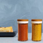 Ganesh Airtight Transparent Kitchen Storage Container Jar Set (2 Pc) - Closeup Embroidery by Nari Haat, Indian ethnic...