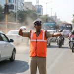 Orange Safety Jacket For Having protection against accidents usually - Closeup Embroidery by Nari Haat, Indian ethnic...