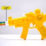 Concept Musical Transparent Glow Gear Gun With Rainbow Light ( 1 pcs ) - Closeup Embroidery by Nari Haat, Indian ethn...