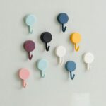 Small self-adhesive wall hooks for kitchen and bathroom