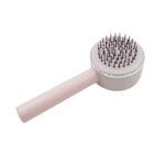 Air Cushion Massage Brush with Long Handle & Self-Cleaning Detangling Comb - Back View by Nari Haat, Indian ethnic we...