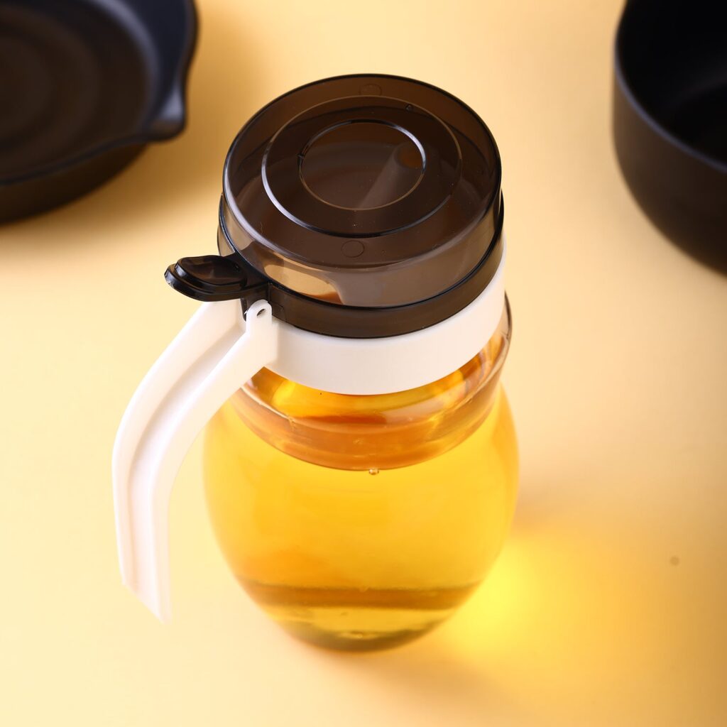 Plastic oil dispenser with small nozzle