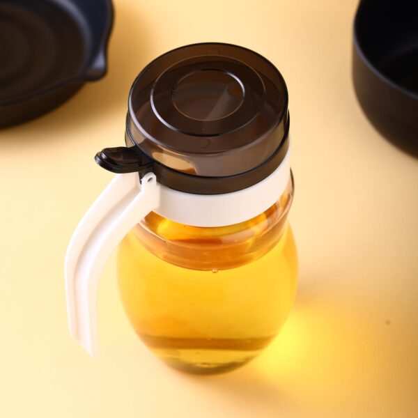 Plastic oil dispenser with small nozzle