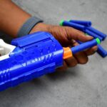 Hi-Arm gun with foam suction bullets