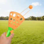 Catapult Butt Ball Toy widely used by kids and childrens - Back View by Nari Haat, Indian ethnic wear, women clothing...