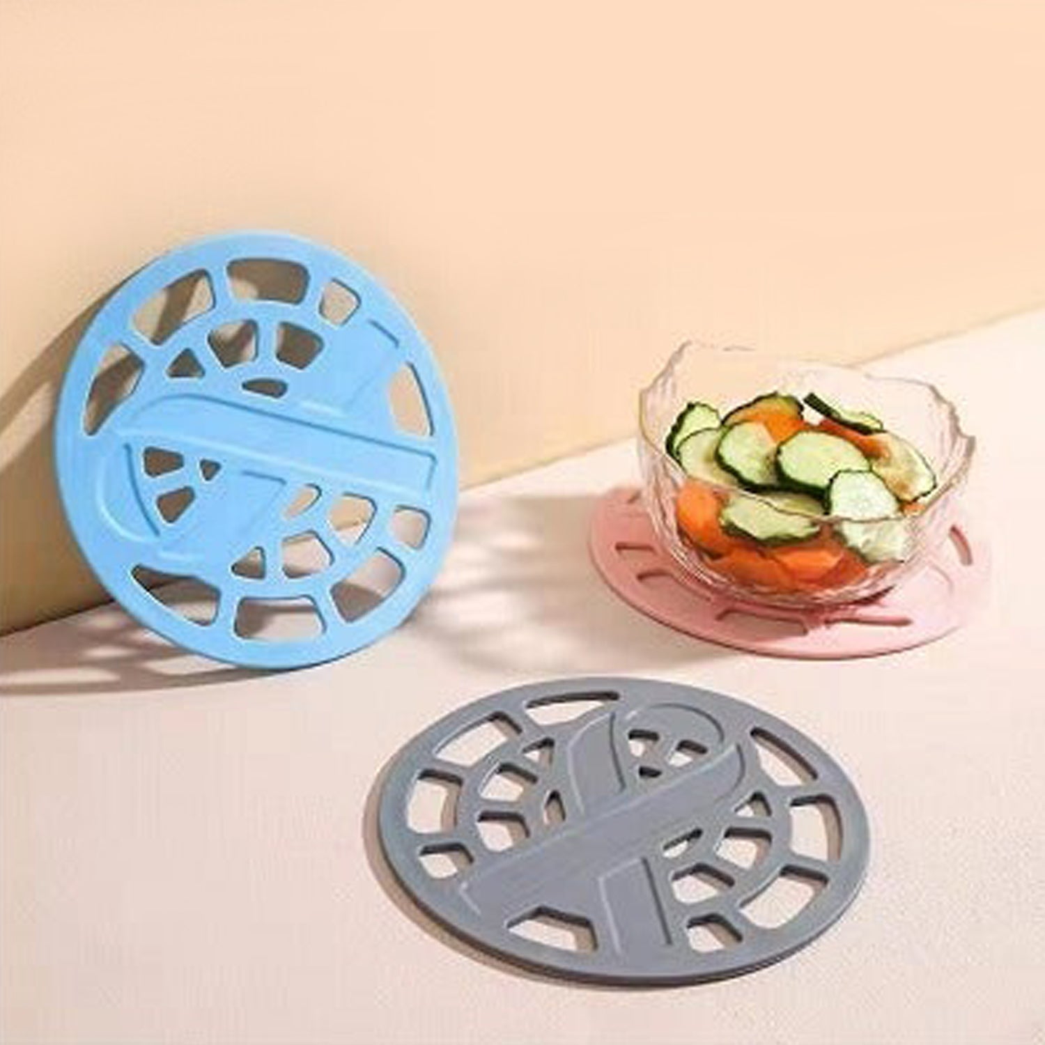2600_6_2fc00e8d-eefb-4215-9079-3fcba78c90da.jpg 1Pc Silicone Fancy Coaster holding bowls and utensils including all kitchen purposes. - Front View by Nari Haat, Indi...