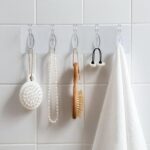 Transparent adhesive wall hook for heavy items