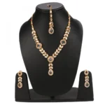 Gold Plated Traditional Kundan Necklace Set with Earrings and Maang Tikka - Image 4