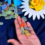 Glass Gem Stone, Flat Round Marbles Pebbles for Vase Fillers, Attractive pebbles for Aquarium Fish Tank. - Front View...