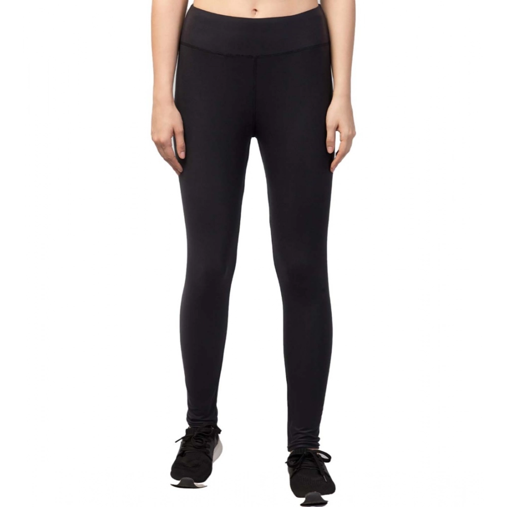 Model wearing NariHaat Black High-Rise Tights