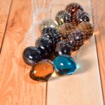 Glass Gem Stone, Flat Round Marbles Pebbles for Vase Fillers, Attractive pebbles for Aquarium Fish Tank. - Back View ...