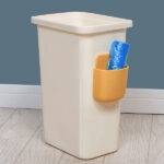 Wall Mounted Storage Case with Mobile Phone Charging Holder - Closeup Embroidery by Nari Haat, Indian ethnic wear, wo...